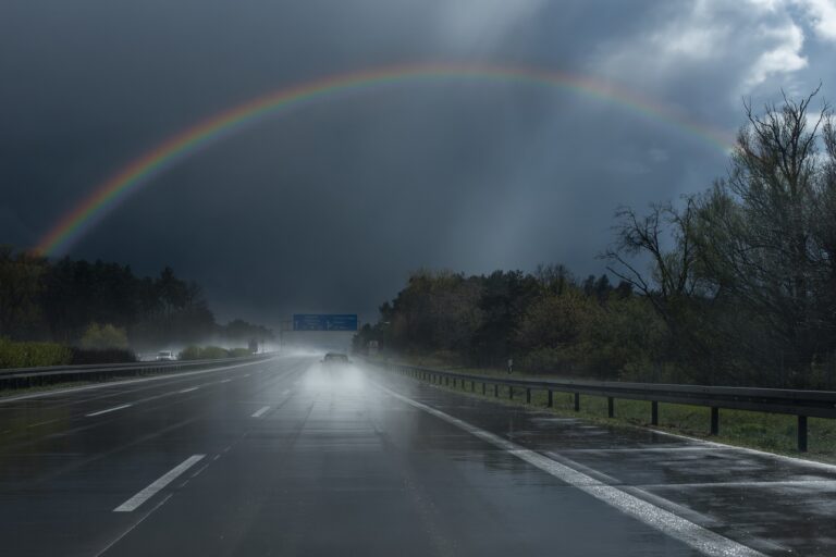 car driving rainbow